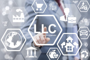 Limited Liability Company concept. Businessman touched LLC word icon on virtual screen. Business, industry, medicine, real estate, auto manufacture, finance, internet, store start up strategy